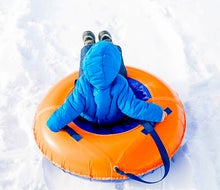 Snow tubing is a favorite winter activity in Chicago. Photo courtesy of Canva