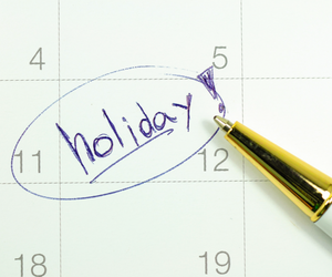 holiday written on a calendar with the date circled